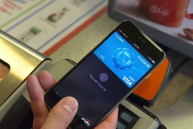 At a store, consumers can simply pay by just holding their iPhone near a contactless reader with their finger on Touch ID or enter a passcode and their transaction will be authenticated in seconds. Photo: McDonalds Corp/Flickr