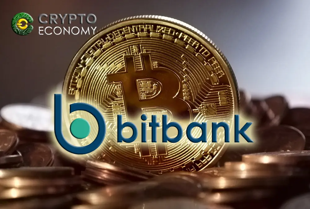 Close-up of a Bitcoin with bitbank logo and Crypto Economy text in the background.