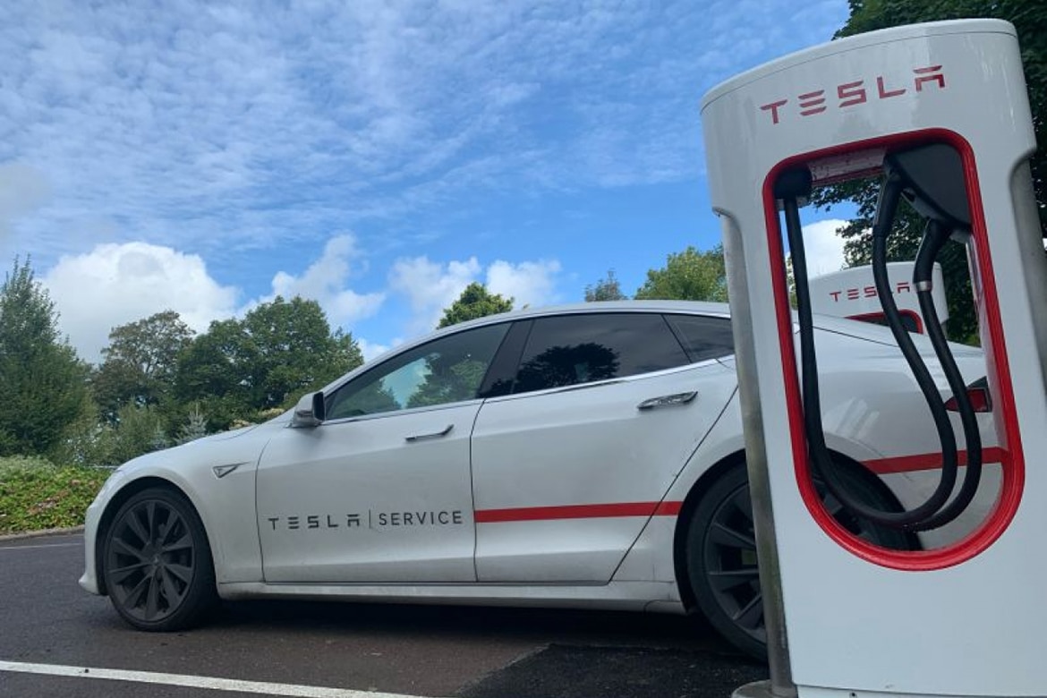 TSLA Stock Hits Record $1,219.50, Tesla Opens Supercharger Trial Program for Other EVs
