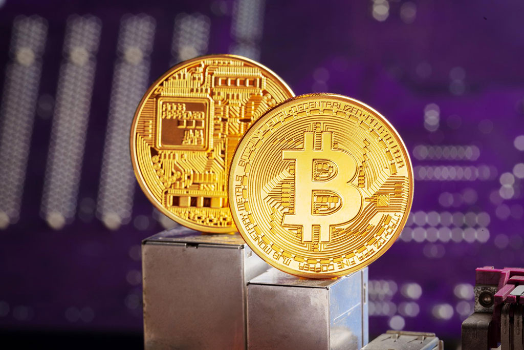 Crypto Stocks Rise in Pre-market as Bitcoin Nears $52,000 and Market Cap Crosses $1T