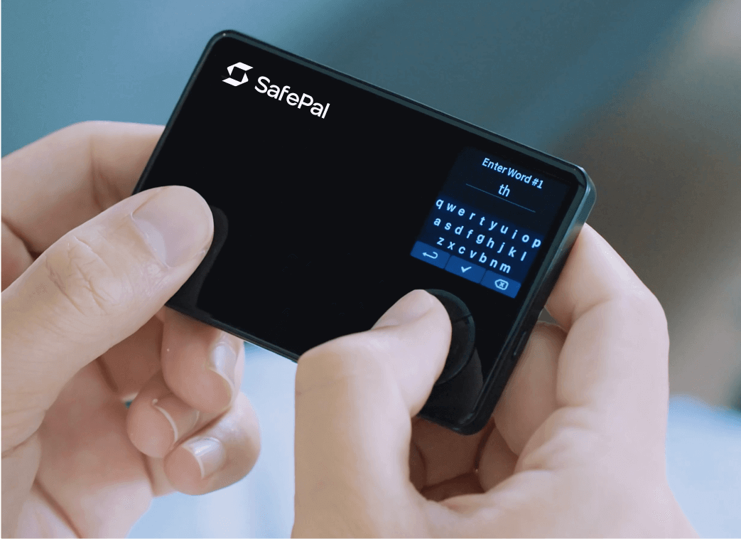 SafePal cold wallet in action, entering a recovery word on the device for offline key storage and transaction signing. Source: SafePal