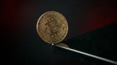 Bitcoin Price Falls to $77,000 During Weekend Amid $600M+ in Liquidations